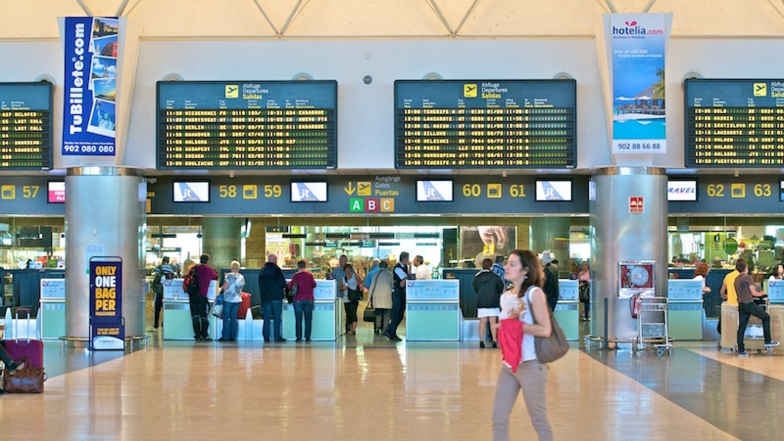 Flight Boards and Check in Counters in the departures International Terminal at Gran Canaria Airport Las Palmas (LPA)