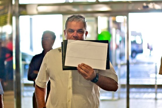 Private transfer driver waiting in the international arrivals hall at Gran Canaria airport